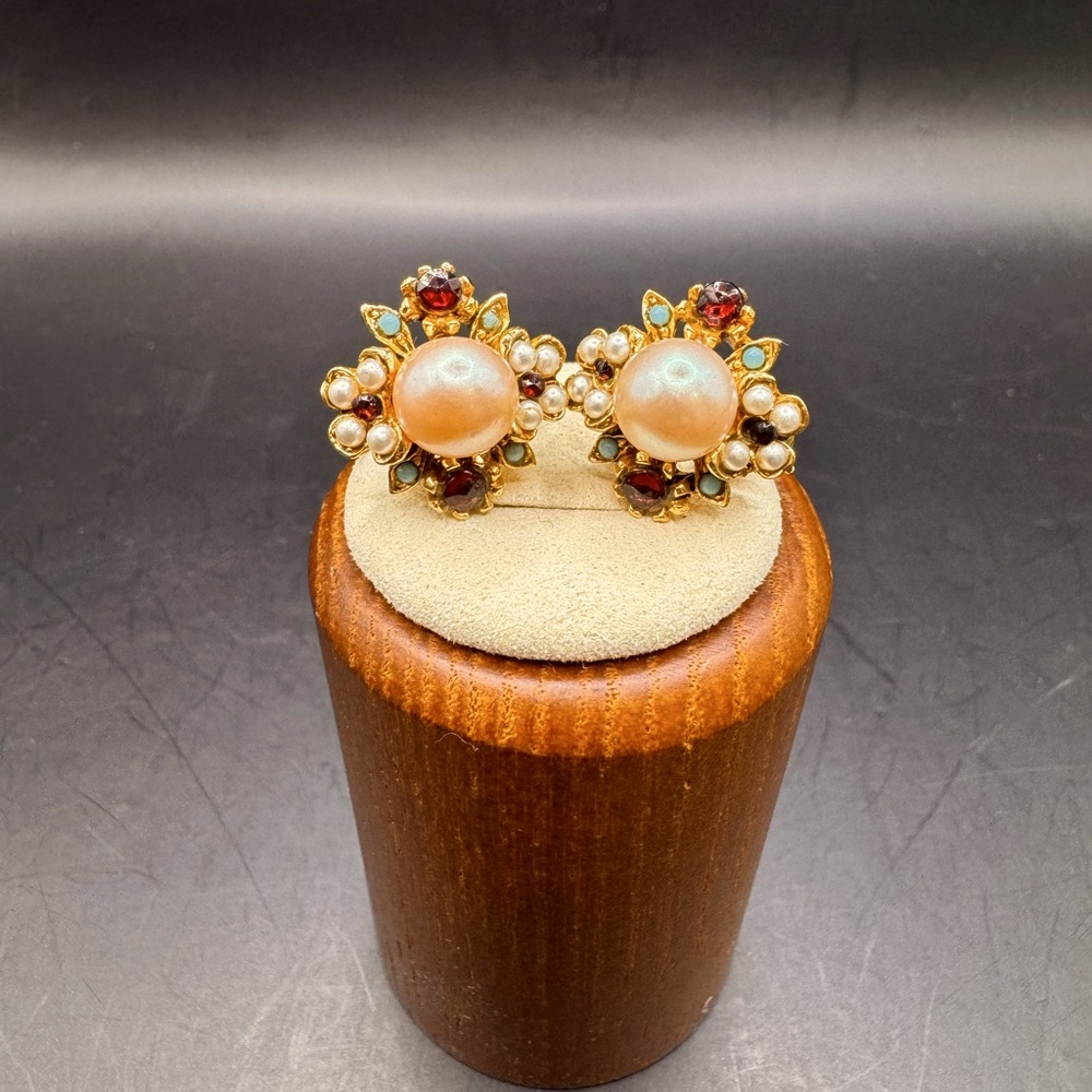 Vintage gold tone pearl, garnet and turquoise clip on costume earrings.